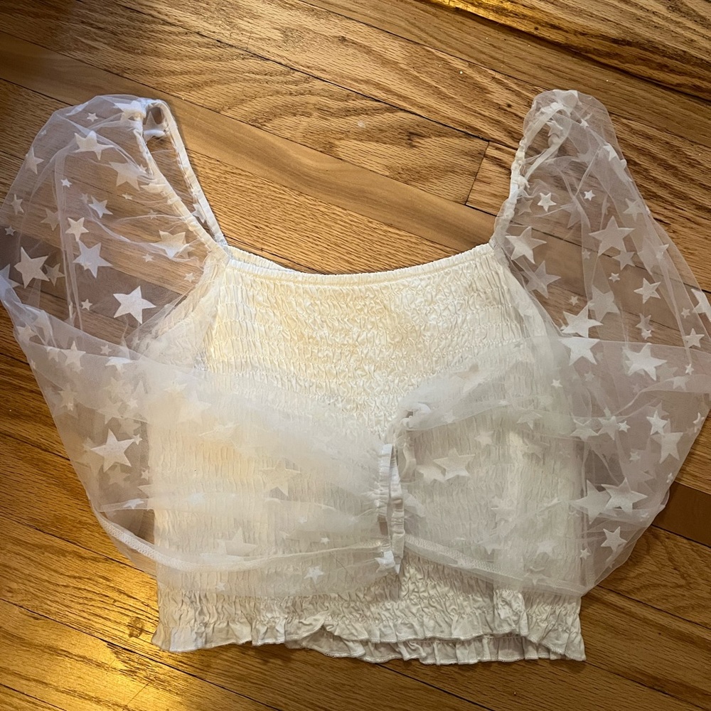 Sheer star sleeve cinched crop top